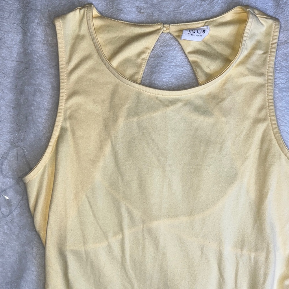 Banana yellow open back bodysuit from Lelis Collection!